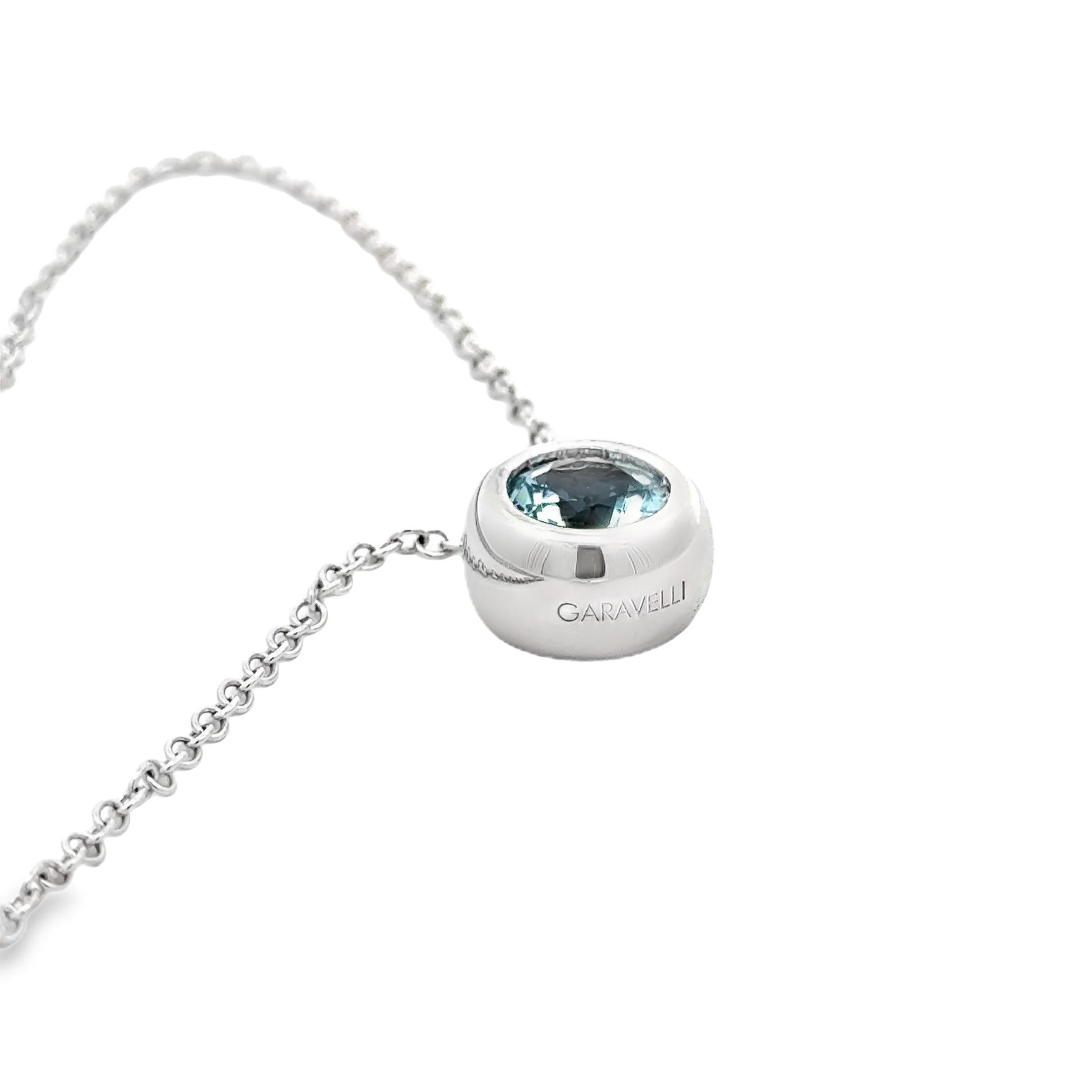 Garavelli  Round Pendant in 18kt Gold with Aquamarine from the new Giotto Collection of pendants .
18kt gold Necklace included , lenght 19 inches with a loop at 17
18kt gold grs 8.26
Aquamarine mm  8 diameter , weight  carats 1.54
Aquamarine is the