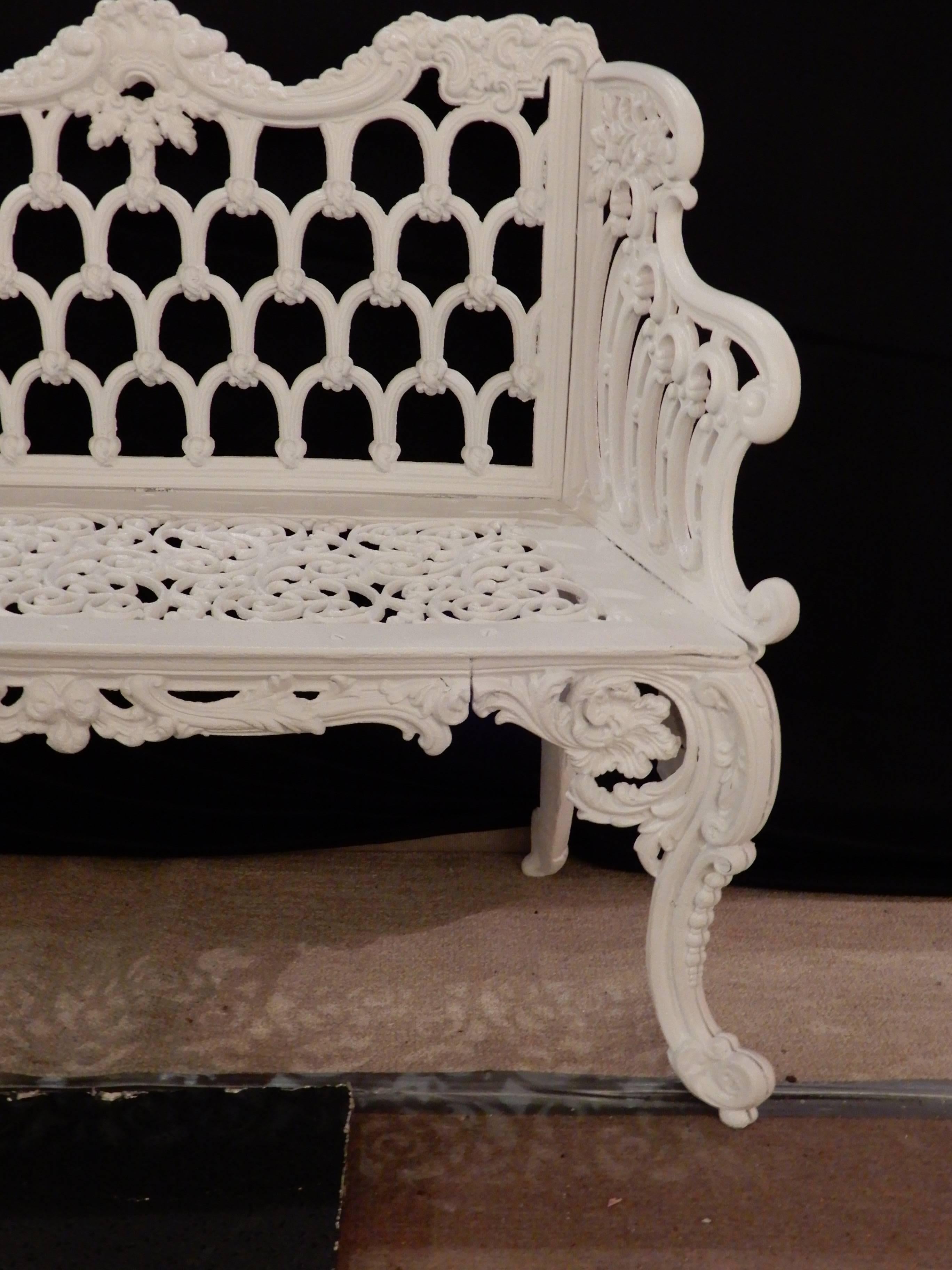 A late 19th century cast iron garden bench in the iconic “Rose Garden” or gothic pattern
The bench is shown in 19th century images of the White House Rose Garden from the 1850s to present. This bench was sandblasted and freshly painted white. It