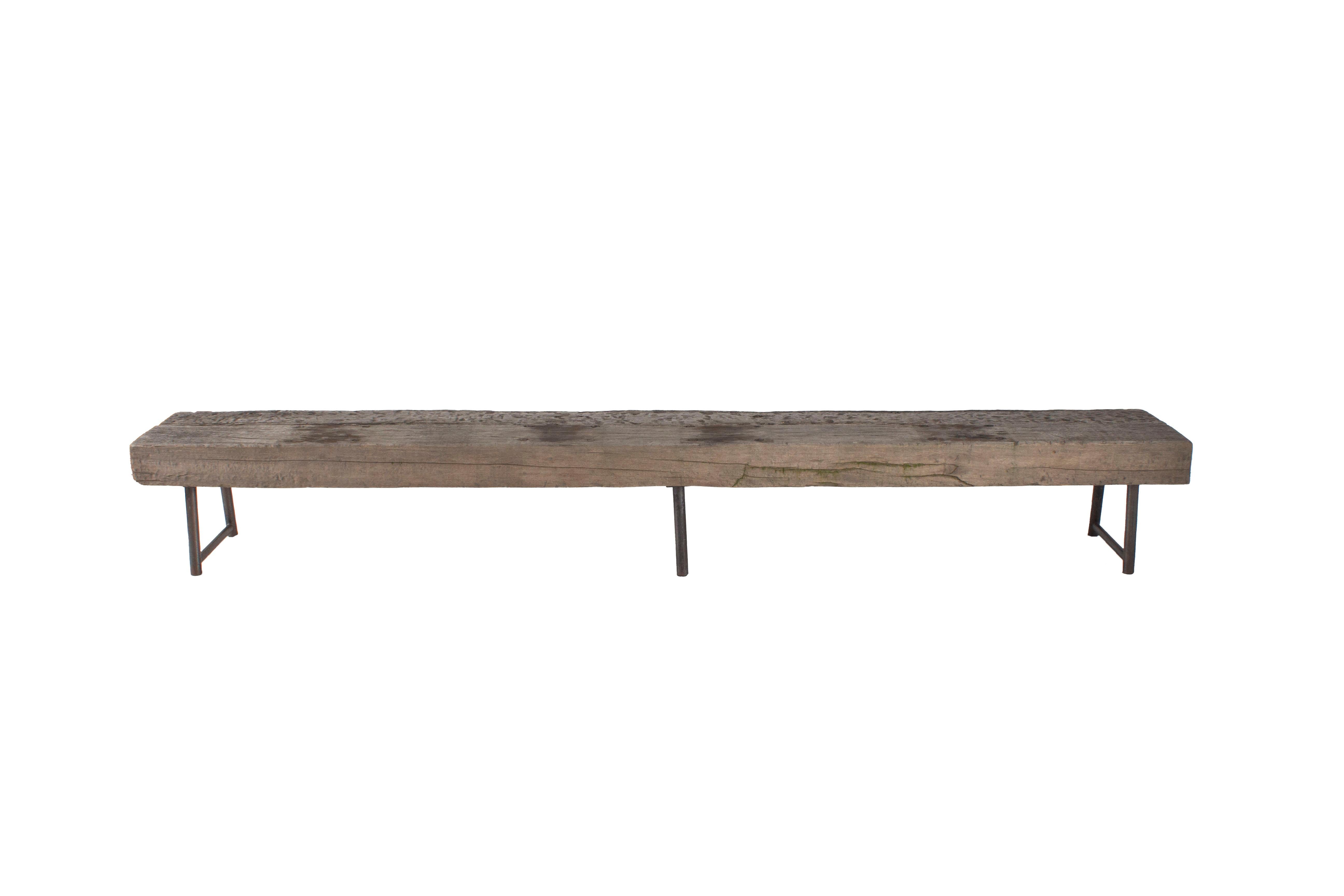 Garden bench made from repurposed teak

Steel legs.

Imported from Europe, one of a kind piece.