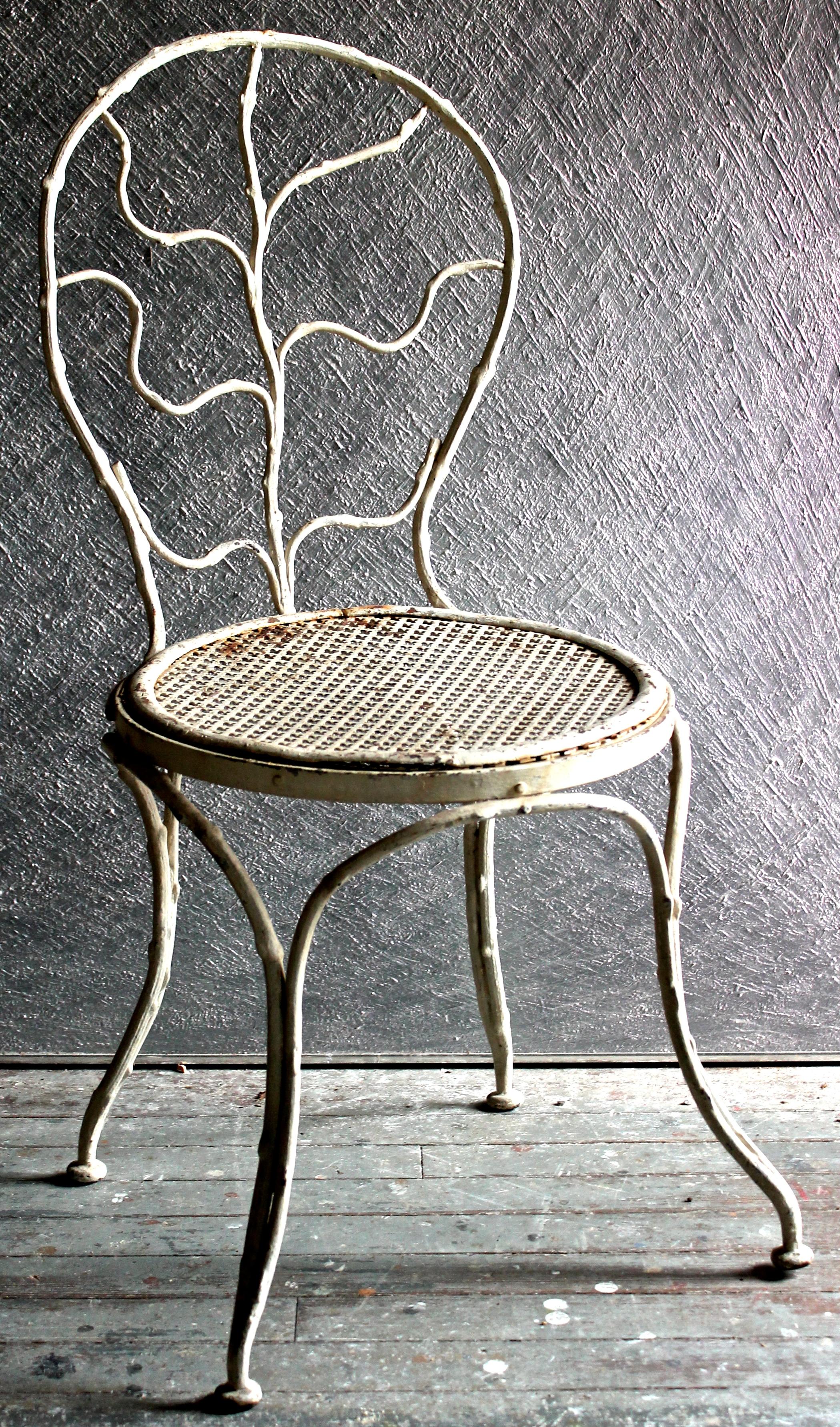 Garden chairs in forged wrought iron by Durenne Foundries. This model from the late 19th century, taken over by Jean-Michel Frank. Bibliography: F. Baudet, 'JM Frank, Memoire du Style Collection', Paris 1998 p.23. Catalog of the estate of Madame