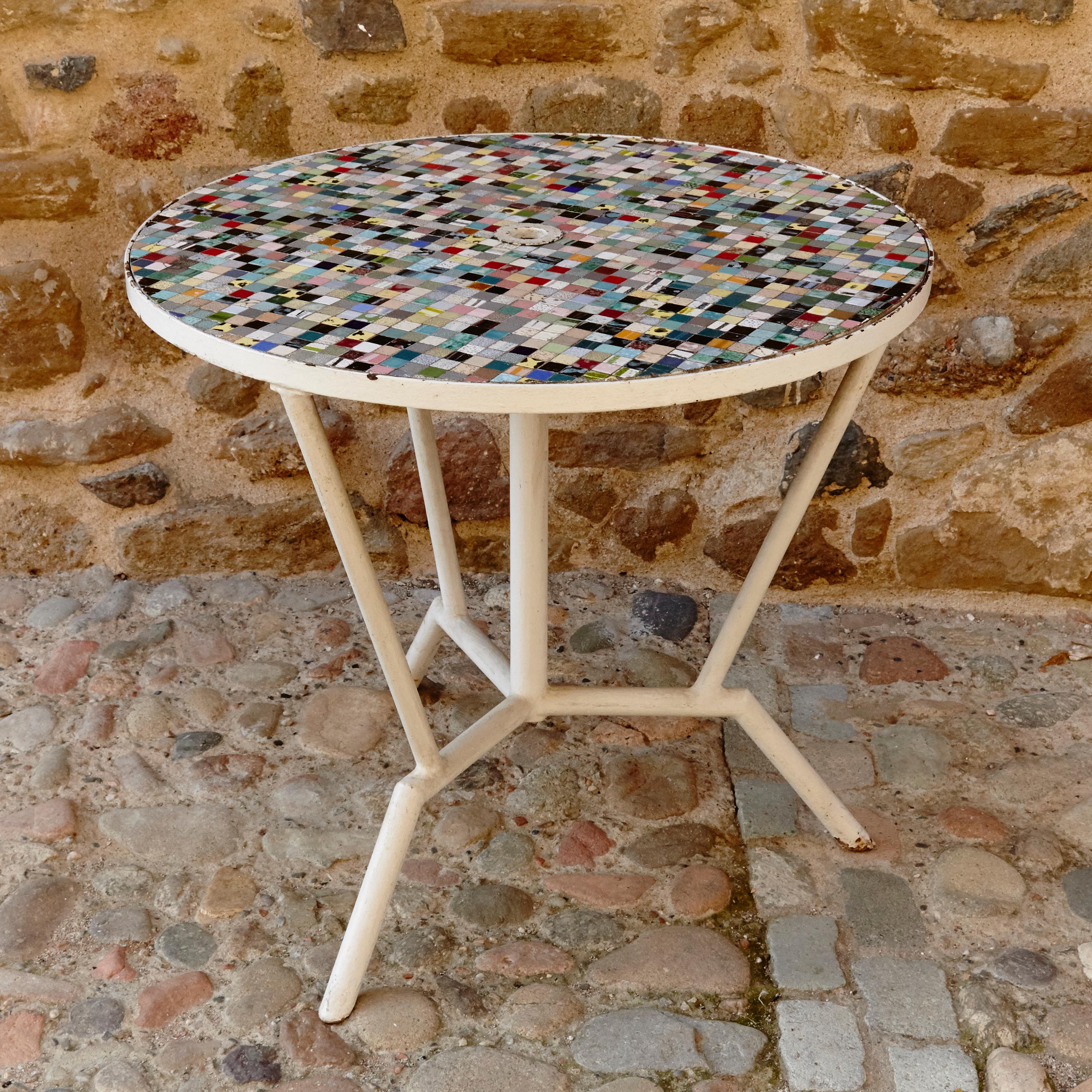 Garden colored table with tiles, circa 1960.
By unknown designer.
Manufactured in France.

In original condition with wear consistent of age and use.
  