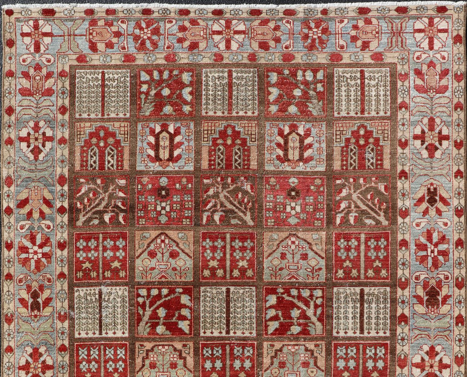 Beautiful and cheery colors of this garden design Persian antique carpet with colorful garden motifs, rug R20-0723, country of origin / type: Iran / Bakhtiari, circa 1930's

This antique Bakhtiari rug from mid-20th century Persia features design