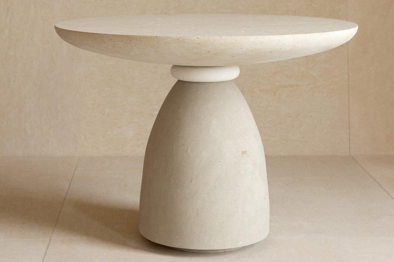 A pair of sculptural white and beige tables crafted of Lime stone.
Suitable for both indoor and outdoor environments.?
Short: ø 24