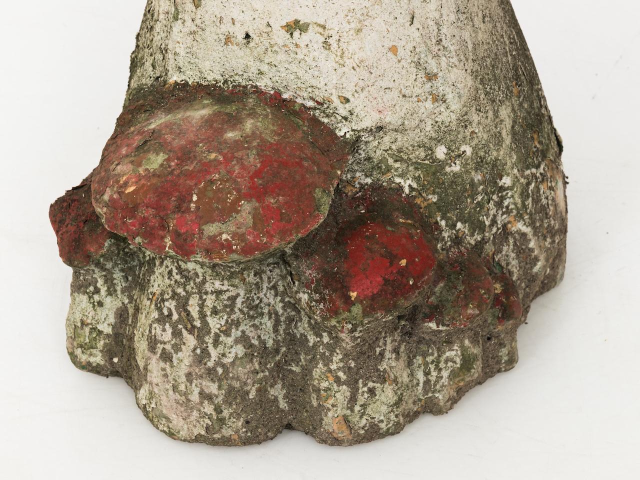Whimsical mushroom garden sculpture that doubles as outdoor seating. Sourced in France, these garden accessories inspired by nature were popular at the turn of the century. Striking original red paint remains on the surface. Three stools available,