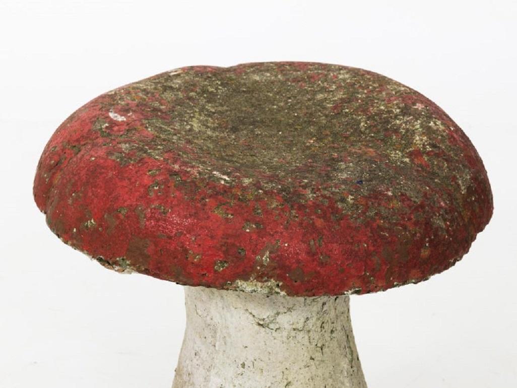 Vintage French cast stone mushroom stool, circa early 20th century. Some original color remains. Three are available.