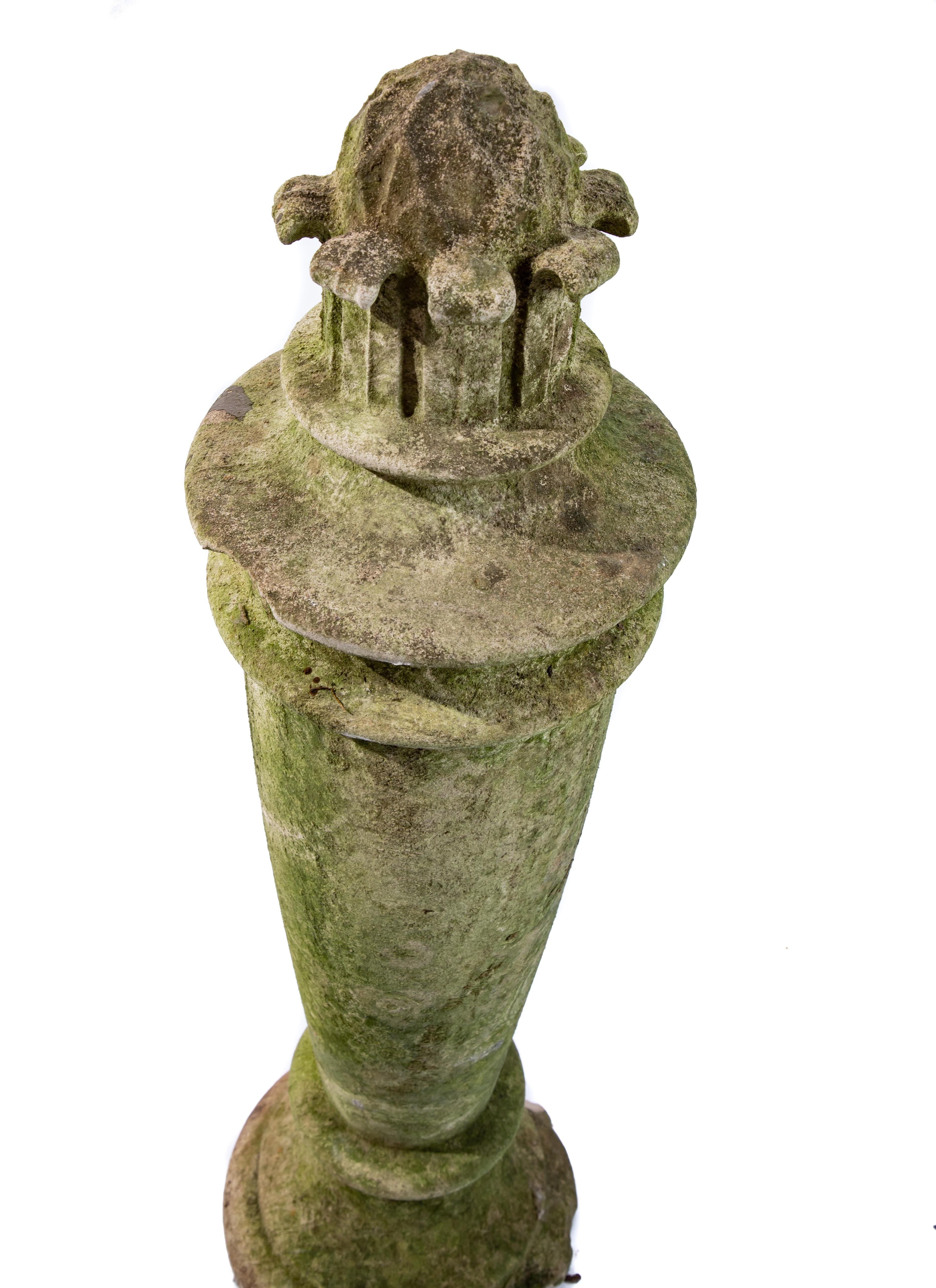 Offering this magnificent pair of garden pedestals. Note these are slightly chipped around the bottoms and the moss is still on them. Very round and urn like these gorgeous pieces will look great in any garden or entrance. They are topped with a