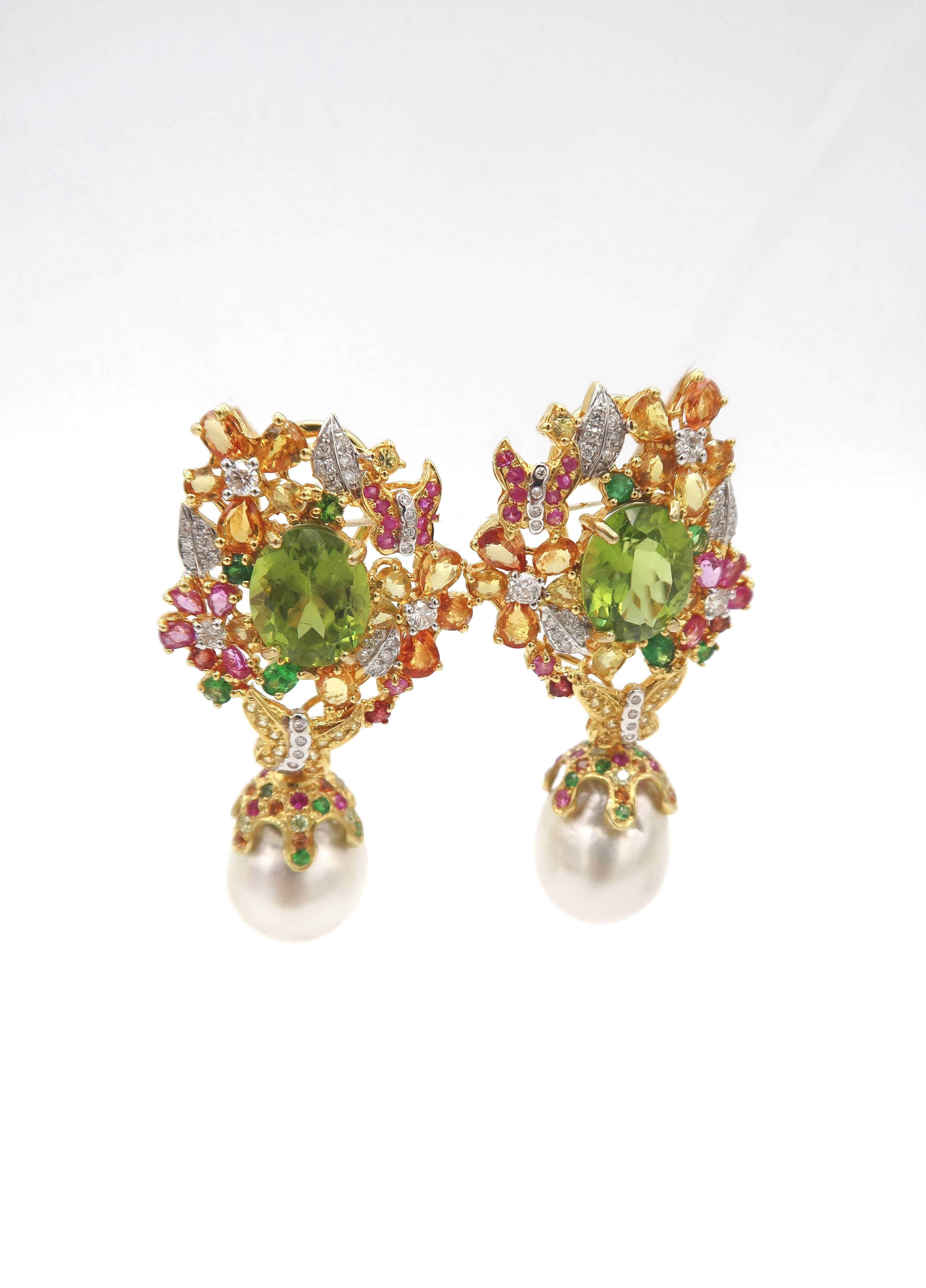 Baroque White South Sea Pearl Drop Earrings in 18K Yellow Gold adorned with Peridot, Tsavorite, Yellow Sapphire, Pink Sapphire, Orange Sapphire and Diamond

Peridot : 8.92cts.
Diamond : 1.01ct.
Other Gems : Tsavorite/ Yellow Sapphire/ Orange