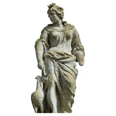 Escultura de jardín de la diosa Hera con pavo real