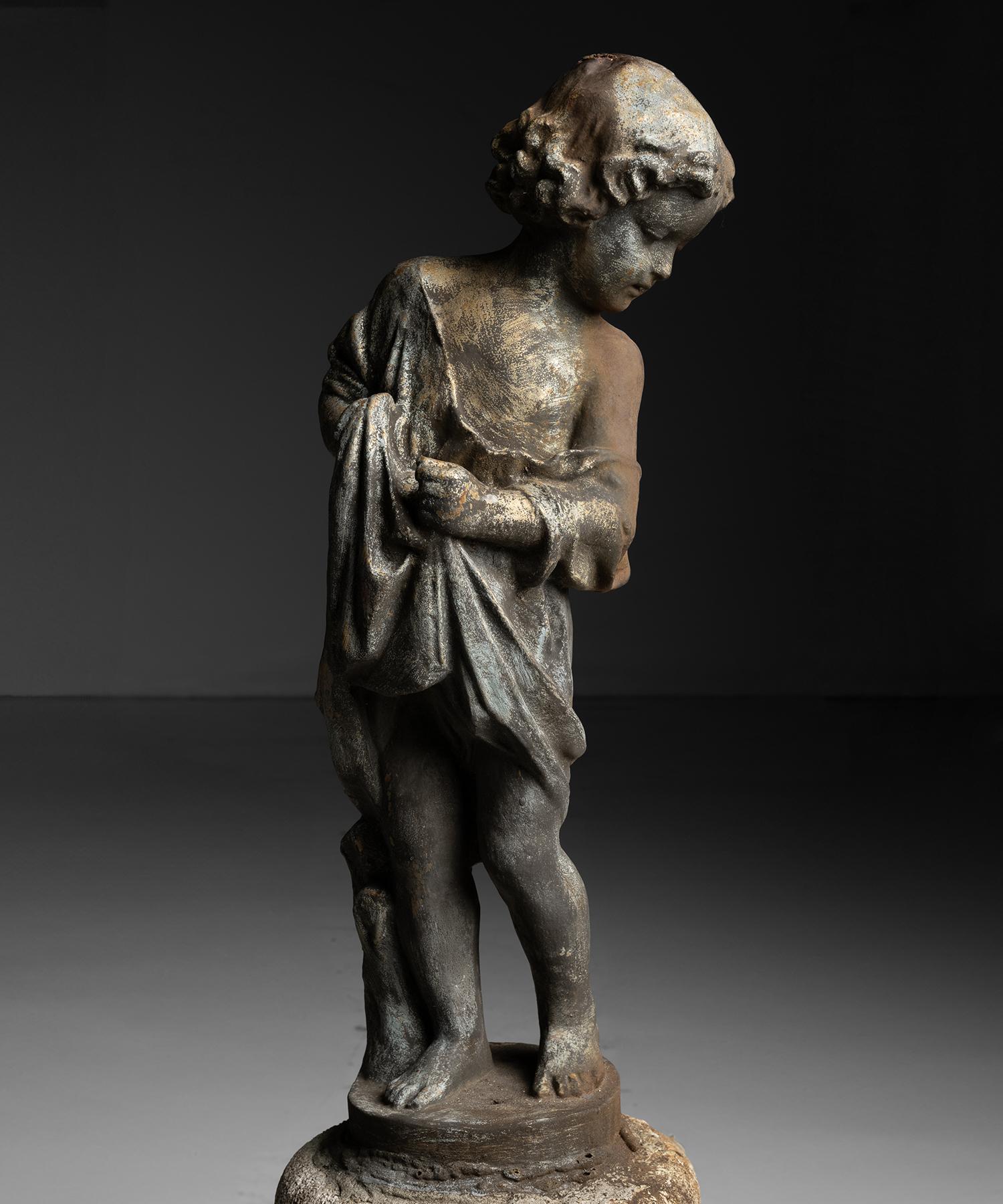 Garden Statue

Belgium circa 1900

Cast iron statue of a boy with draping cloth, on composite stone base.

17.25”w x 17.25”d x 44”h