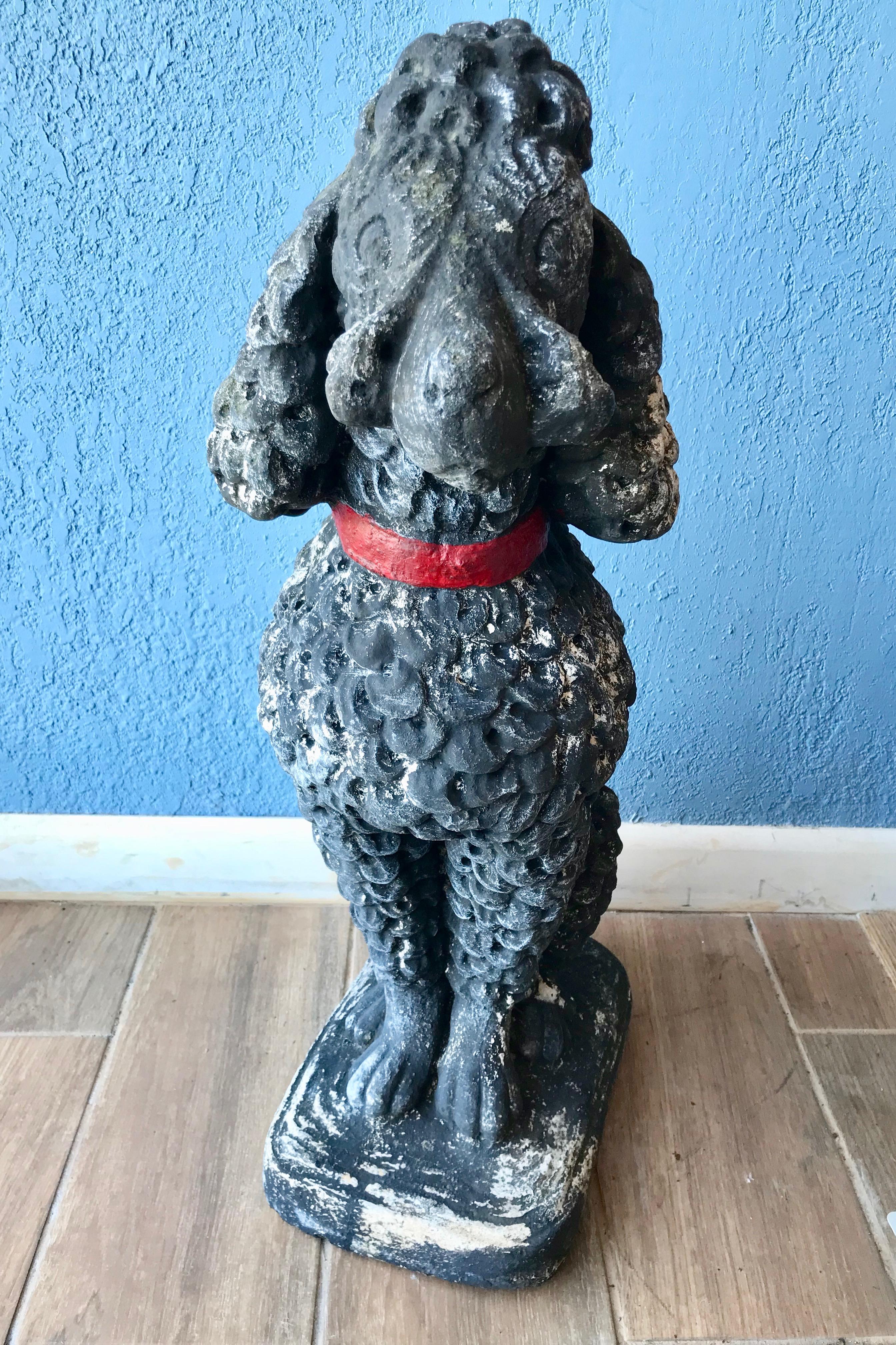 concrete poodle statue
