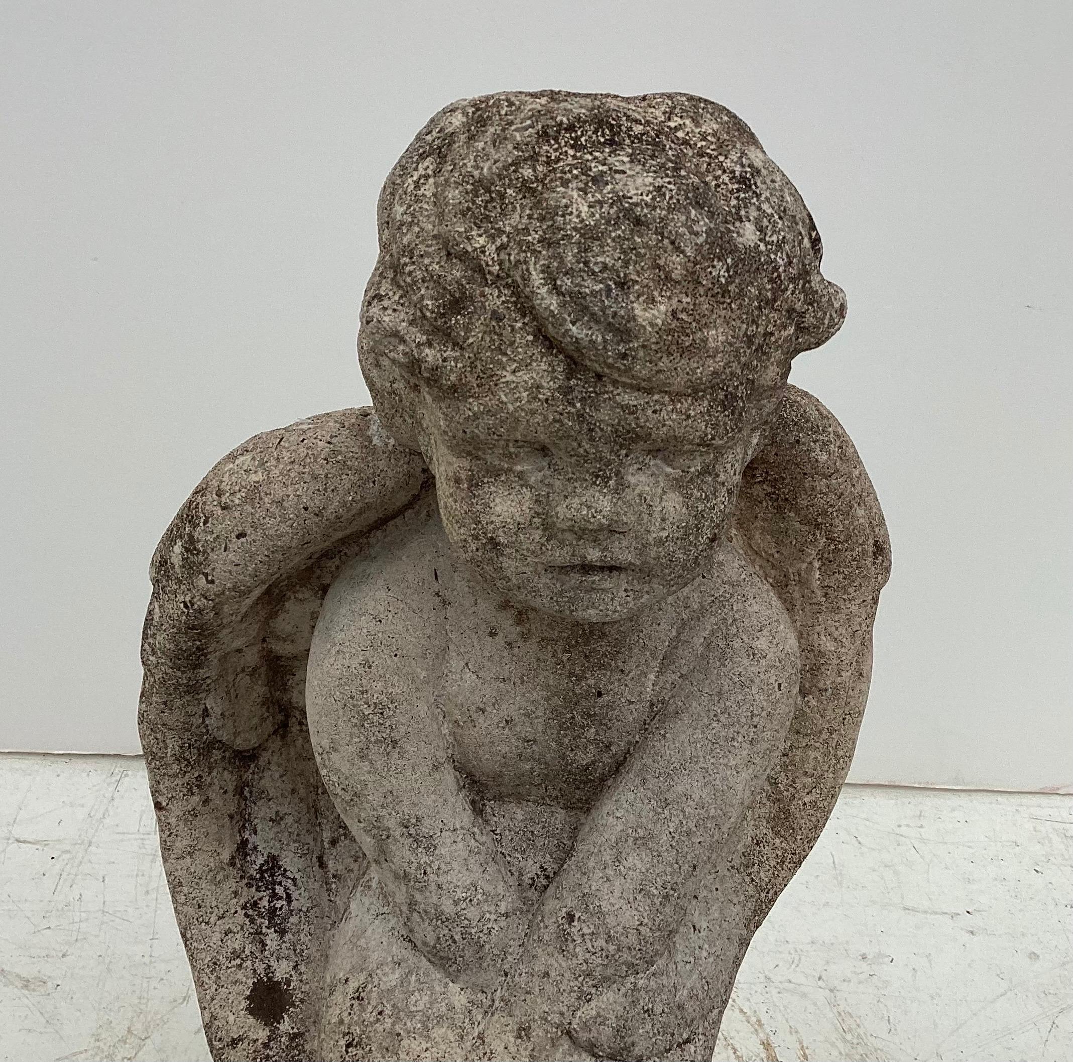 Late 20th Century Garden Stone Winged Sitting Angel or Cherub For Sale
