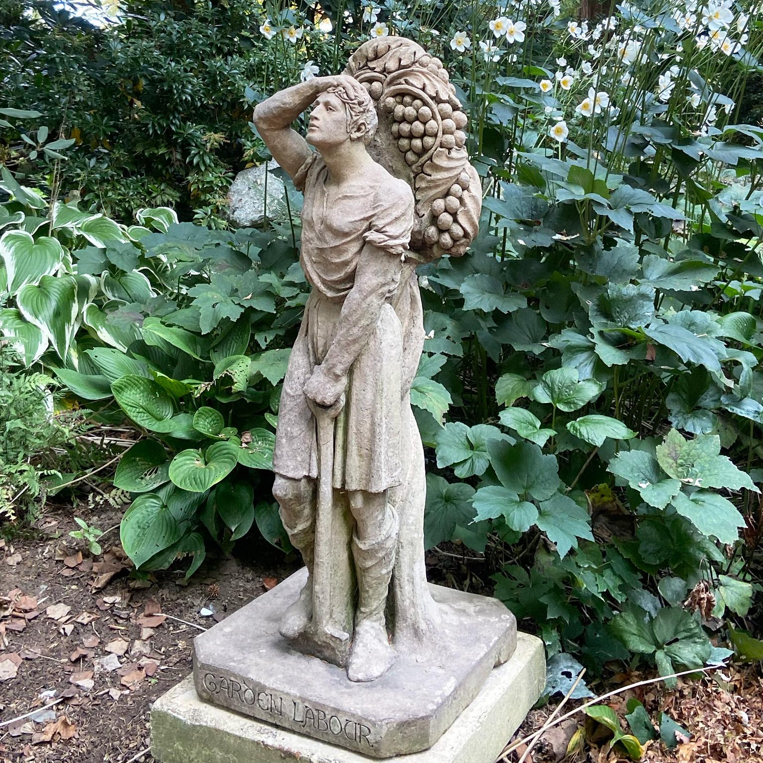 Cast Garden Worker in English Stoneware with Shovel Carrying A Bag of Grapes For Sale