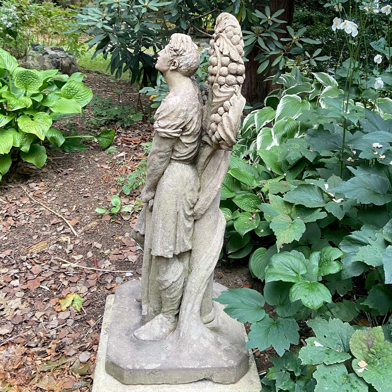 Garden Worker in English Stoneware with Shovel Carrying A Bag of Grapes In Good Condition For Sale In Katonah, NY