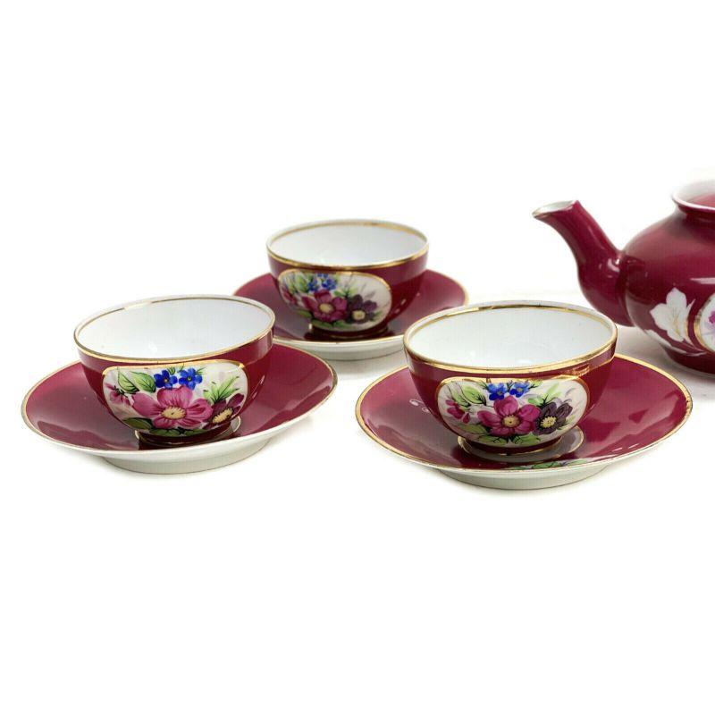 Gardner Imperial Russian porcelain red floral tea service for 6, circa 1890

Red ground with hand painted floral bouquets to the central area. Gardner Russian Imperial marks to the underside.

Additional information:
Color: Red 
Material: