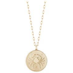 Médaillon du signe du zodiaque cancer en or et diamants de la collection Garland
