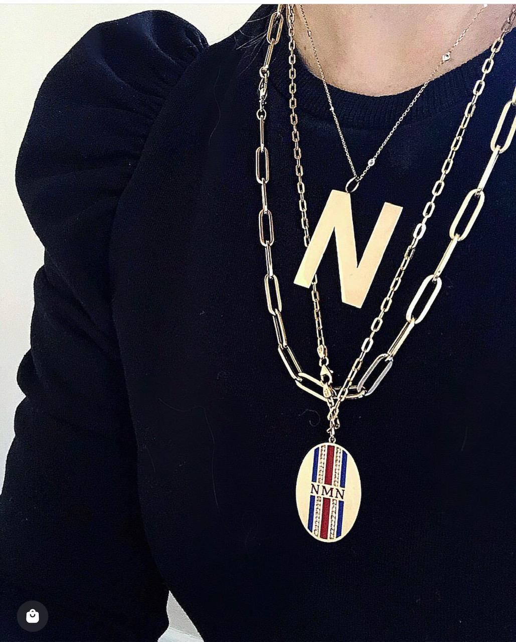 Our Statement Initial Charm Medallions make a major impact. Each extra-large, block, solid gold letter is meticulously custom made by hand. They are available in every capital letter of the alphabet or single number. We love them for their dynamic