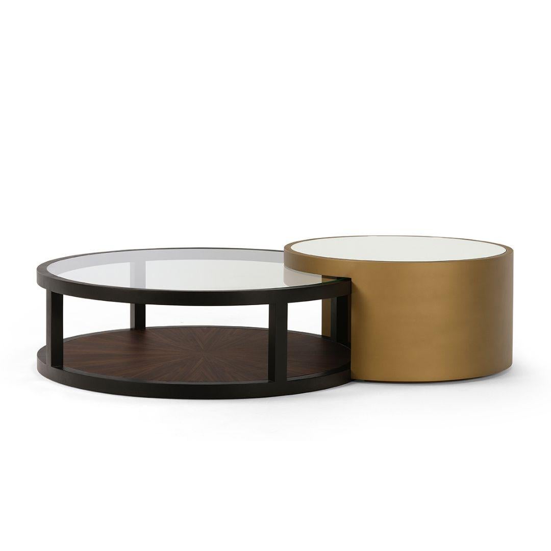 The set of 3 GARLAND coffee tables blend together in a very elegant way, by combining distinctive raw materials, from wood to metallic details or mirrored glass.

Price for the set of 3 Garland coffee tables. Sold separately on request.

Finishes as