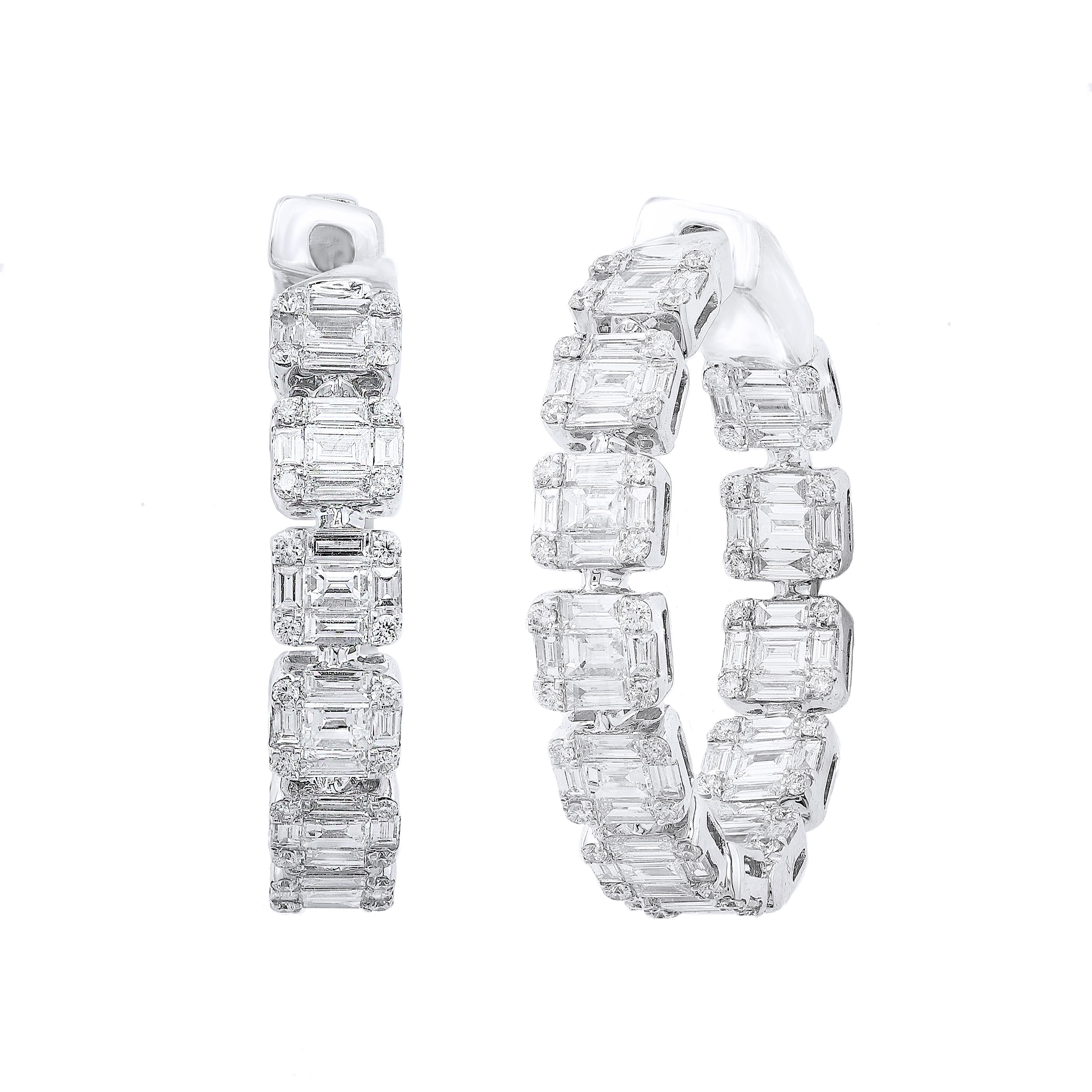 Gorgeous and classic diamond hoop earrings. Features dazzling baguette and round diamonds set in shared prongs to maximize the brilliance of the diamonds. Total weight of the Baguette Diamonds is 4.07 carat and Round Diamonds is 0.56 Carat. Made in