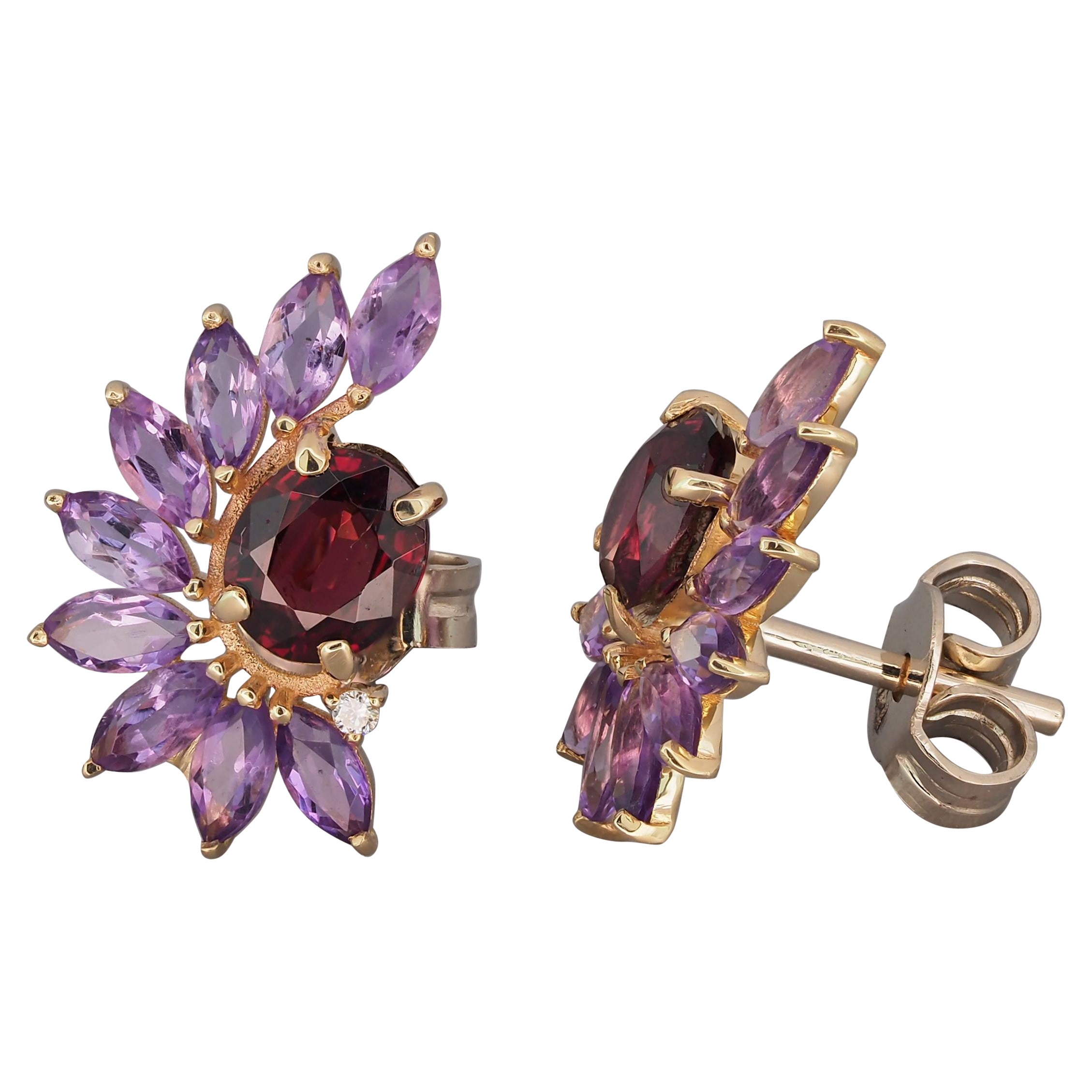 Garnet 14k gold earrings studs.
