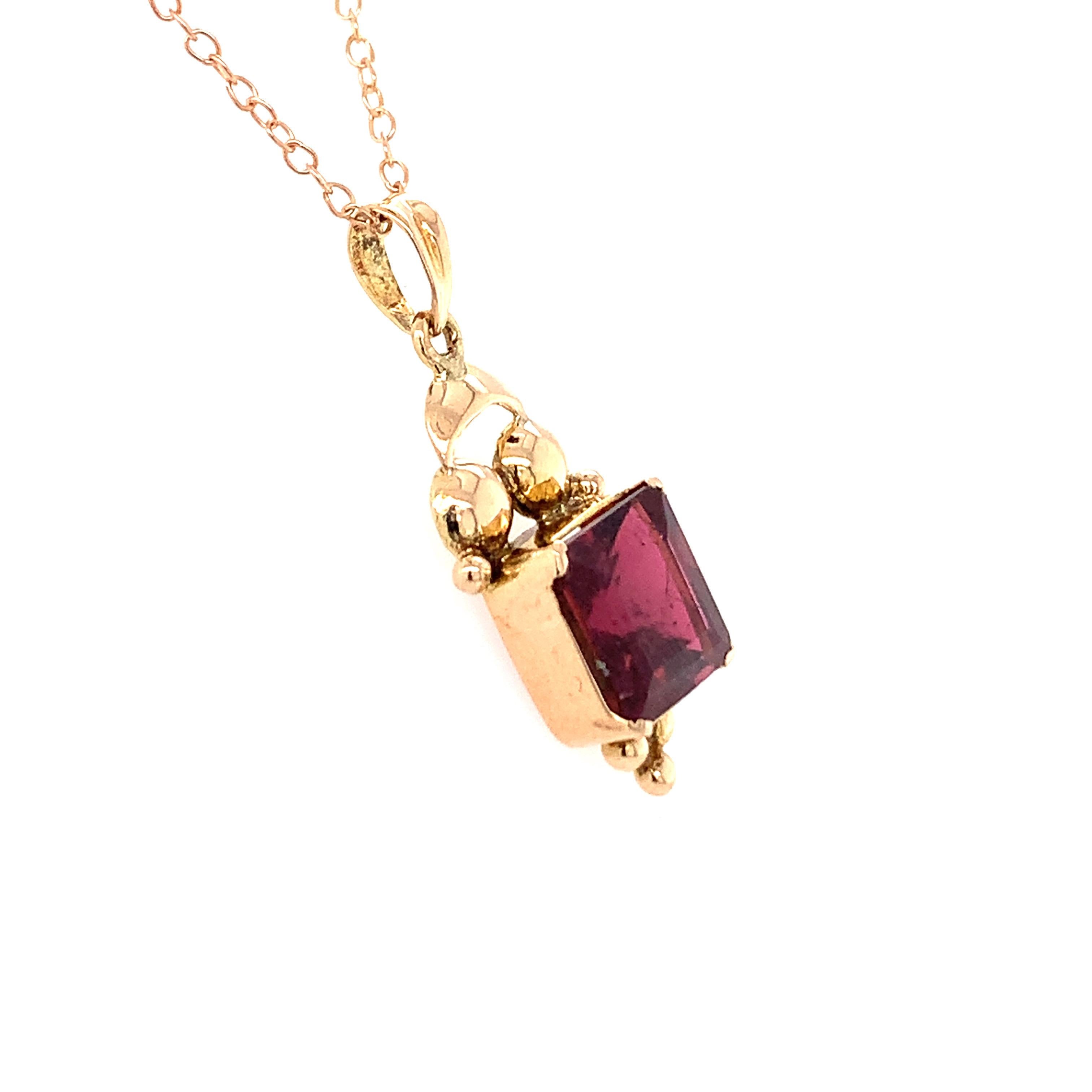 Hand cut and polished natural garnet is crafted with hand in 14K yellow gold. 
Ideal for daily casual wear.
Chain is not included. 
Image is enlarged to get a closer view.
Ethically sourced natural gem stone.