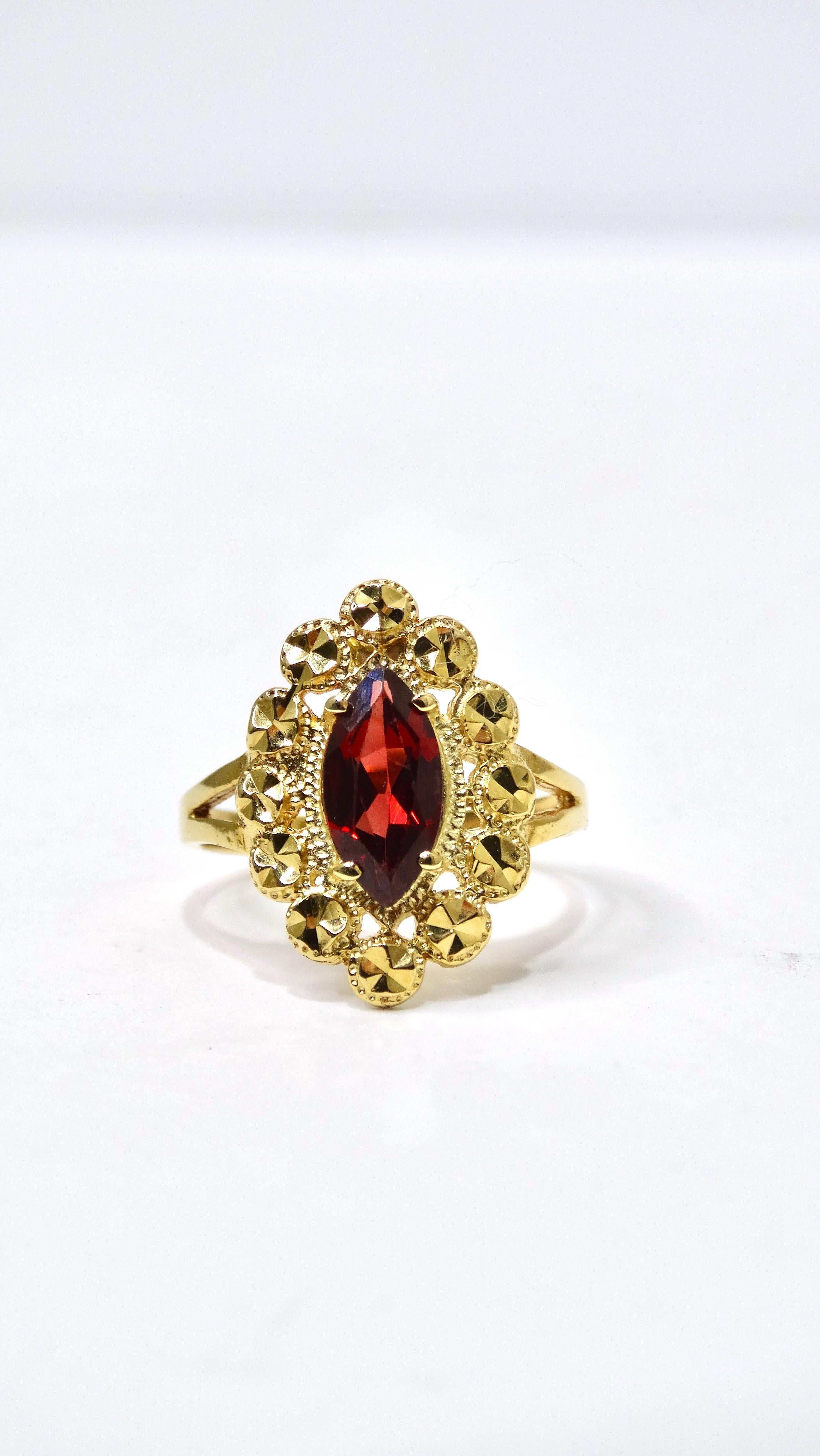 This impeccably designed ring can be yours today! Don't miss your chance to get your hands on this beautiful Garnet stone in a marquise cut. Garnet is the birthstone of January and signifies friendship, protection, trust, commitment, and love. It is