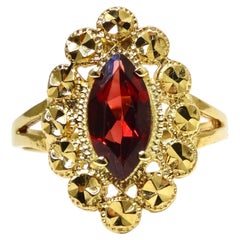 Retro Garnet Marquise Cut and 14k Gold Ornate Ring