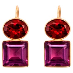 Boucles d
oreilles grenat et améthyste en or 14k