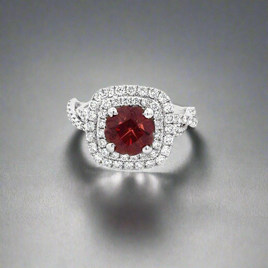 Expertly crafted with intricate details, this classic 18K white gold ring features a stunning 1.96 carat garnet. Luxurious and timeless, this ring is perfect for any occasion and will elevate any outfit. Add a touch of elegance to your jewelry