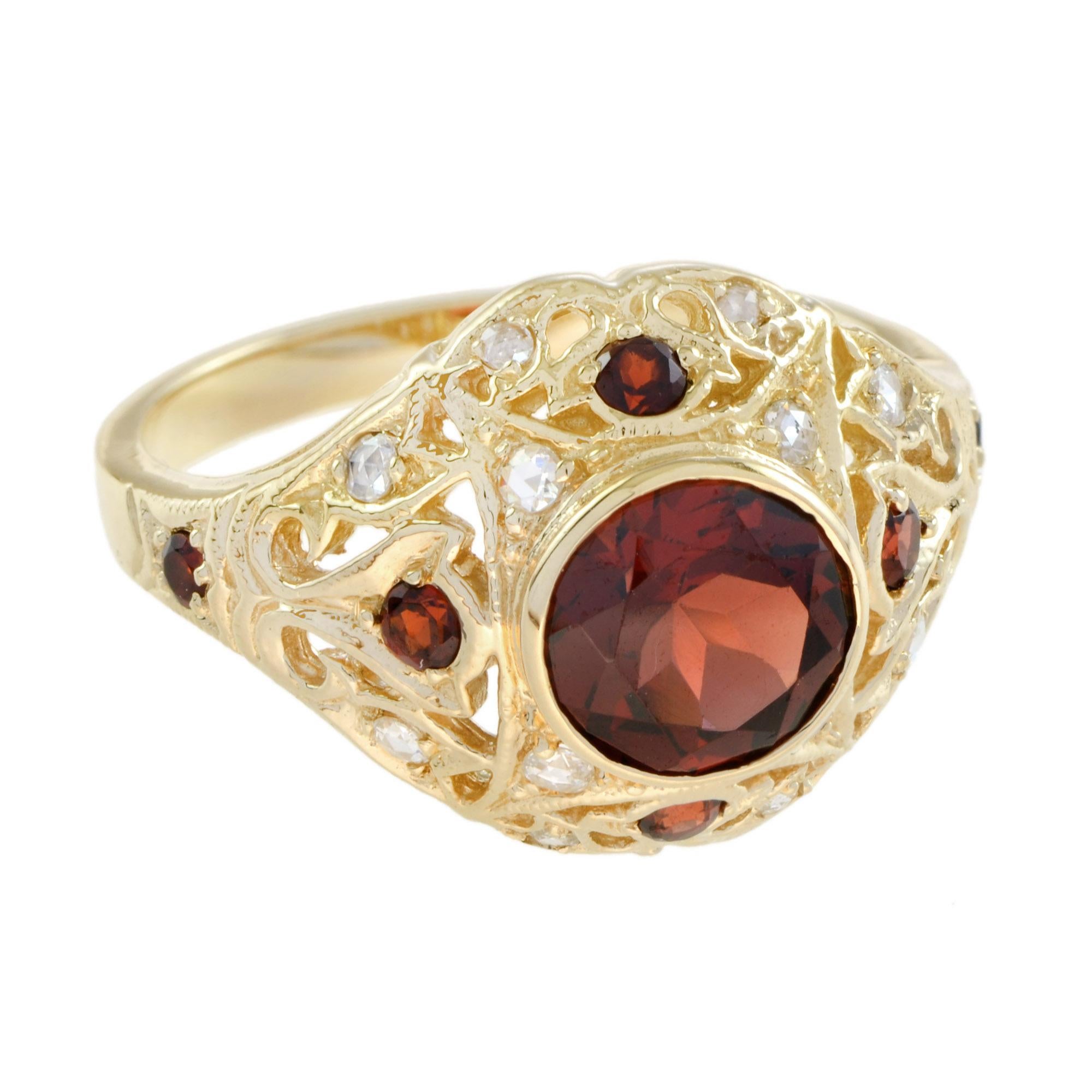 Featured here is an absolutely stunning garnet and diamond ring with glamorous Art Deco inspired design! The center features round natural garnet of 1.63 carats that is highlighted by round garnet and round cut diamonds. Don't miss your chance to
