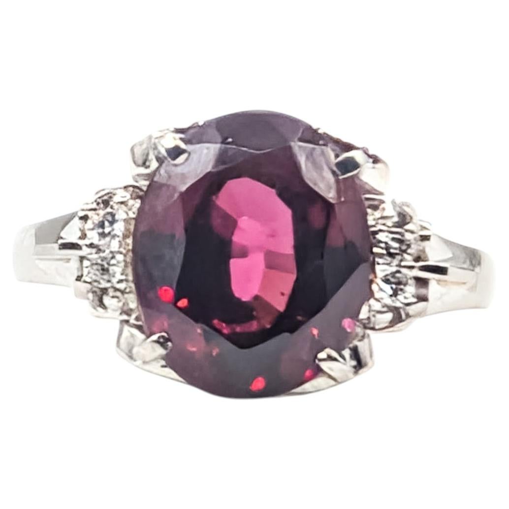 Garnet and Diamond Openwork Ring in 900 Platinum For Sale