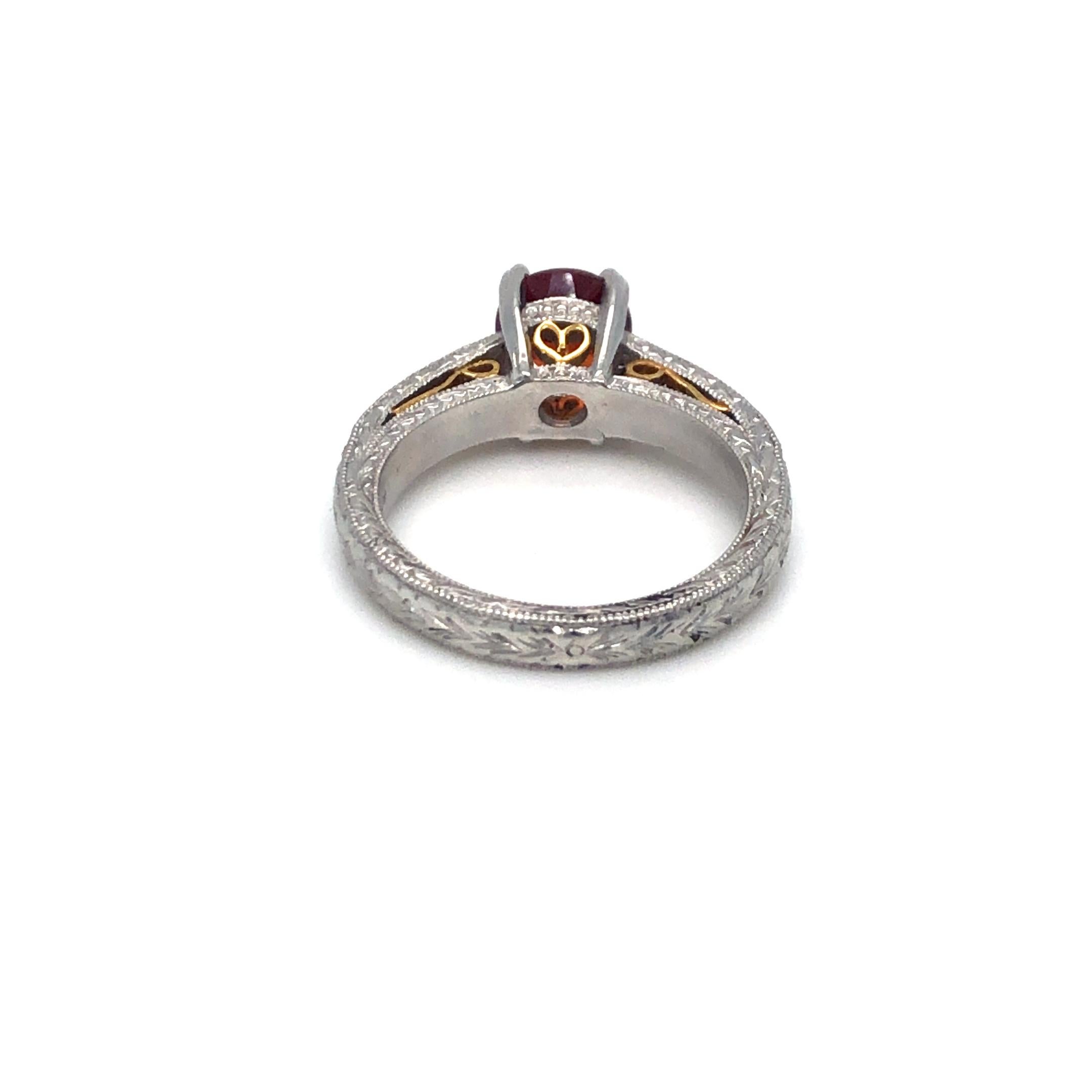 Garnet and Diamond Platinum and 18k Yellow Gold Ring In Excellent Condition For Sale In Dallas, TX