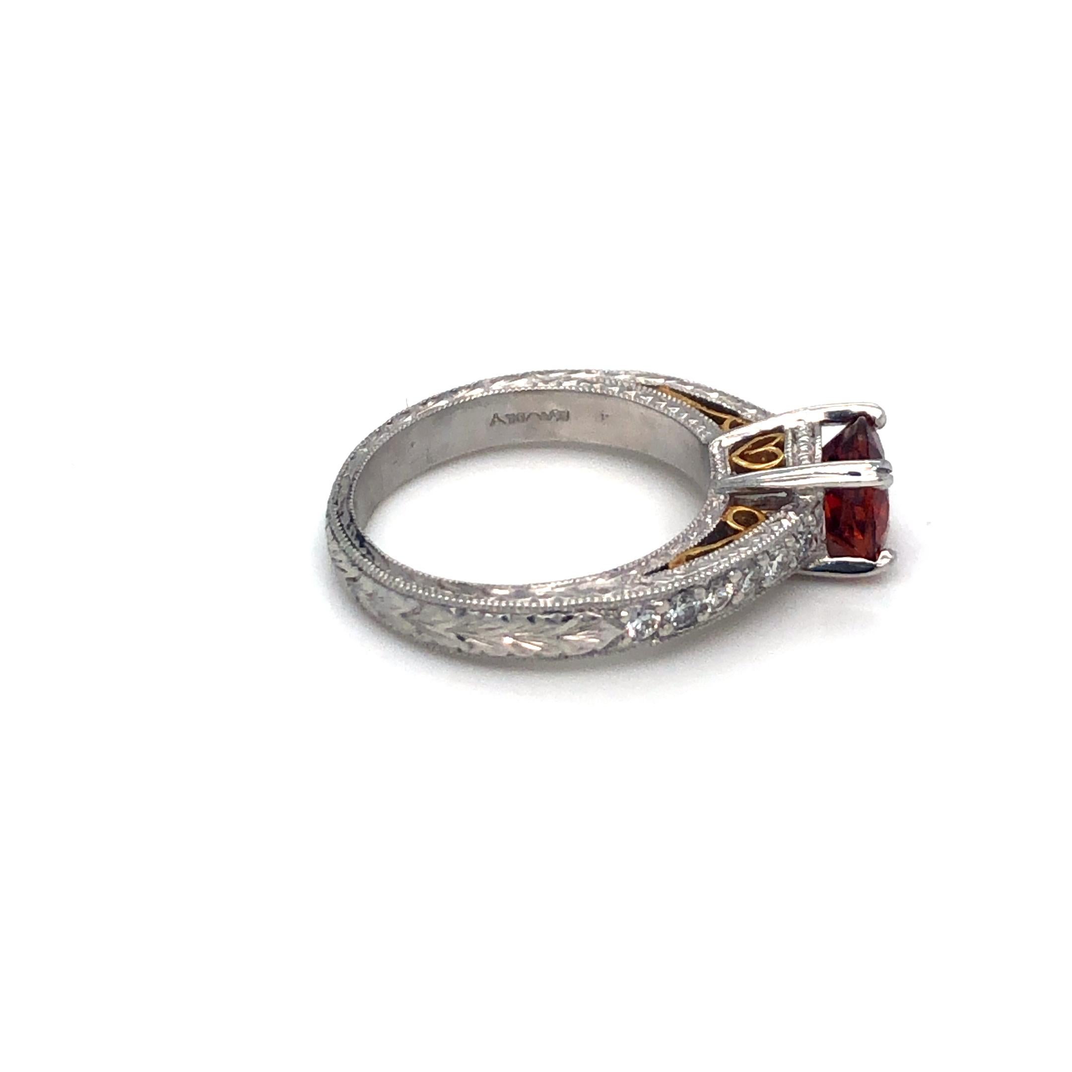 Women's Garnet and Diamond Platinum and 18k Yellow Gold Ring For Sale