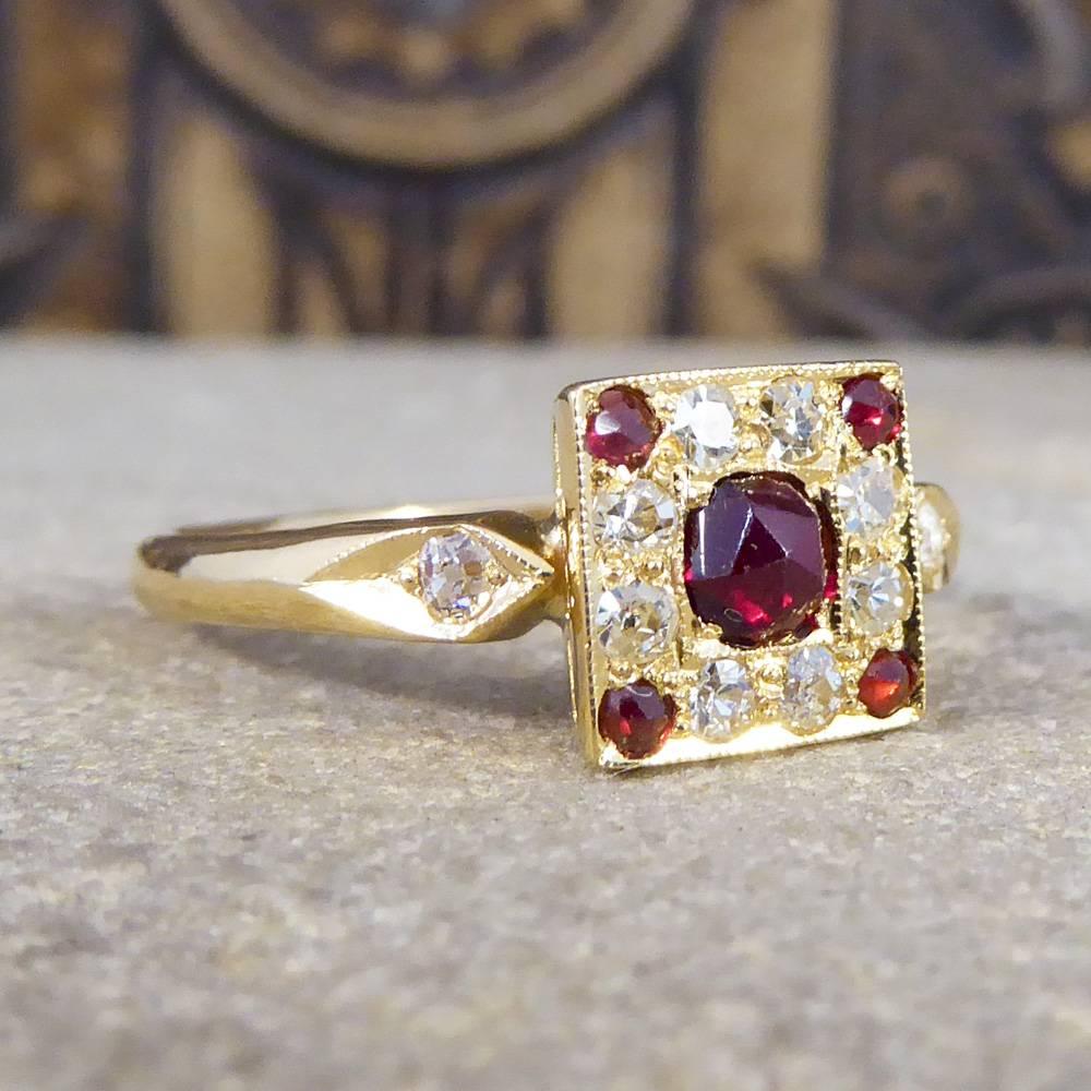Such a great ring crafted from 18ct Yellow Gold with a square shaped face. The face has one larger Rose Cut Garnet stone in the centre and four smaller Rose Cut Garnets in the corners. It has eight Diamonds separating them on the face and one on