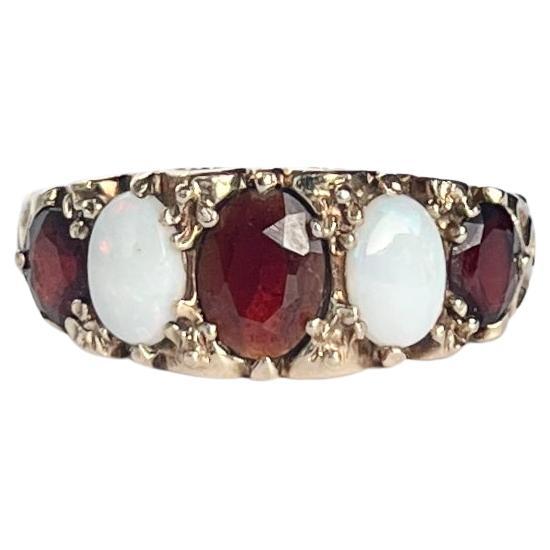Garnet and Opal 9 Carat Gold Five-Stone Ring For Sale