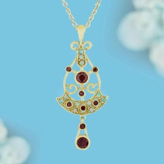Garnet and Opal Antique Style Pendant in 14K Yellow Gold