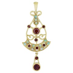 Ciondolo in stile antico con granato e opale in oro giallo 14K