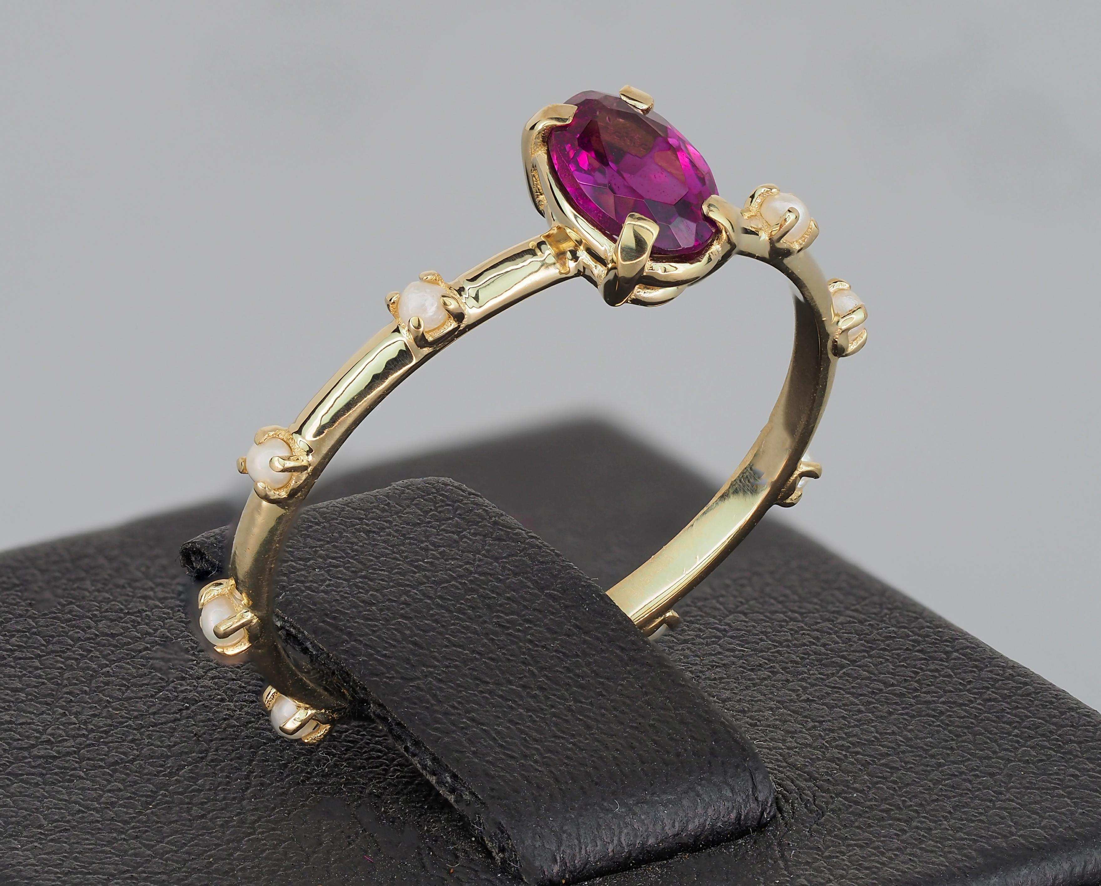 14k gold ring with garnet and pearls. Eternity gold ring.

Metal: 14k gold
Weight: 1.5 g. depends from choosed size.

Set with garnet, color - violetish red (can be little lighter or deeper - you can ask to choose stone in messages)
Oval cut, aprx