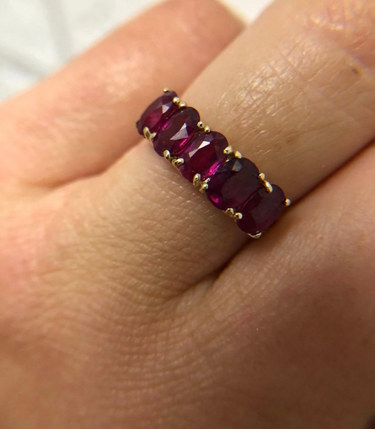 Cute wedding band made with natural garnets in 14KT yellow gold.

Certificate of authenticity comes with purchase!

ABOUT US
We are a family-owned business. Our studio in located in the heart of Boca Raton at the International Jewelers Exchange. We