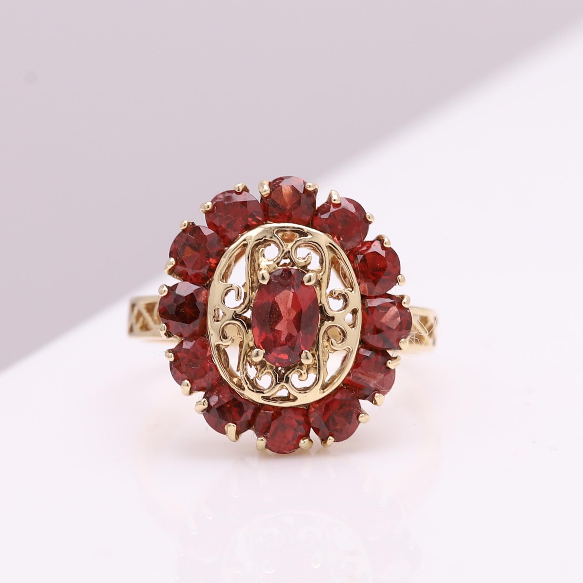 Oval Cut Garnet Cocktail Ring 14 Karat Yellow Gold Large Cluster Fashion Ring For Sale