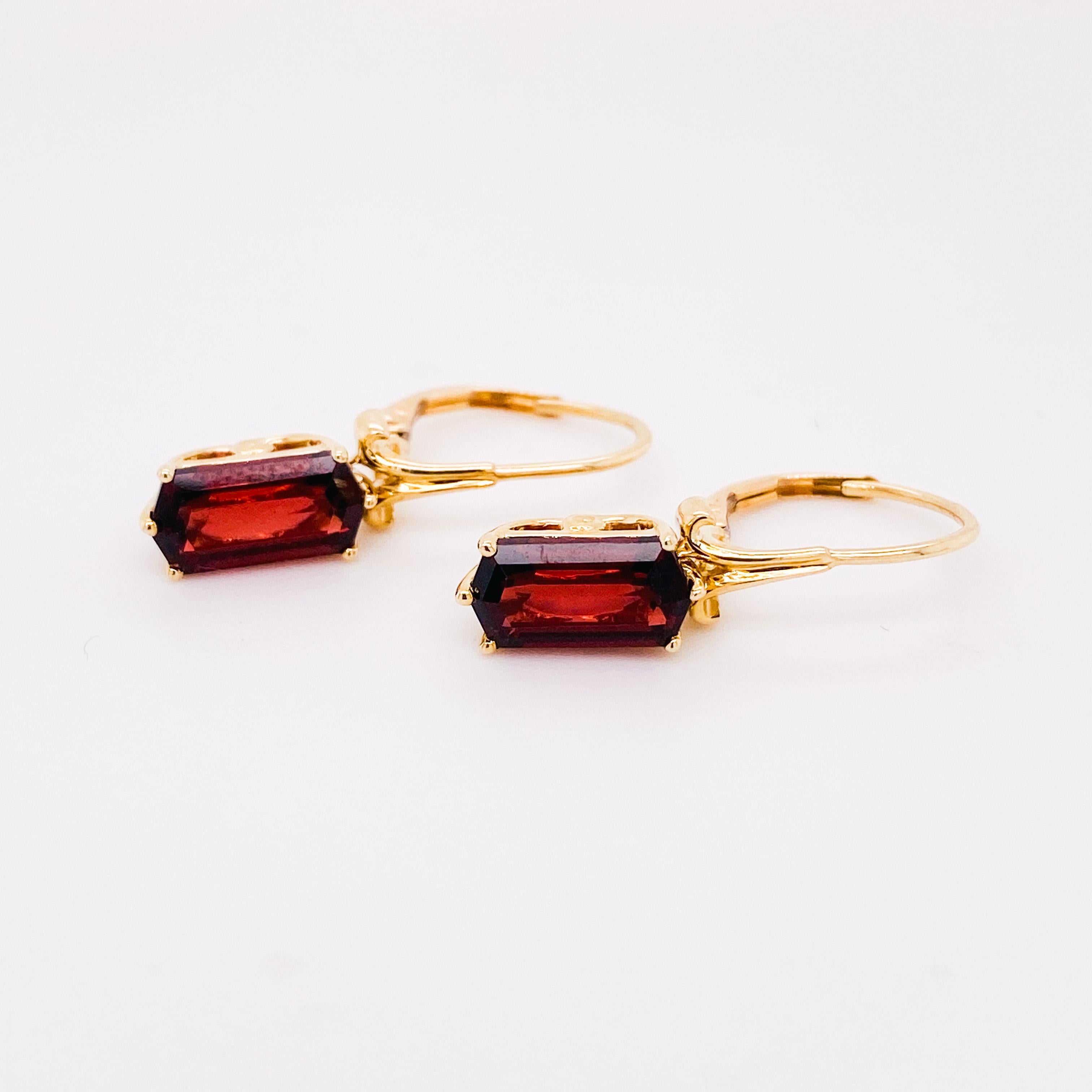 These dangle garnet earrings are a great staple earring for anyone’s wardrobe. You can wear these earrings every day to workout, to work and for dress. We even sold them as a wedding earring. Designed in 14 karat yellow gold with secure lever backs,