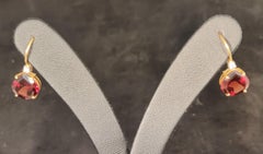 Orecchini con granato e diamanti 18 K con appendino