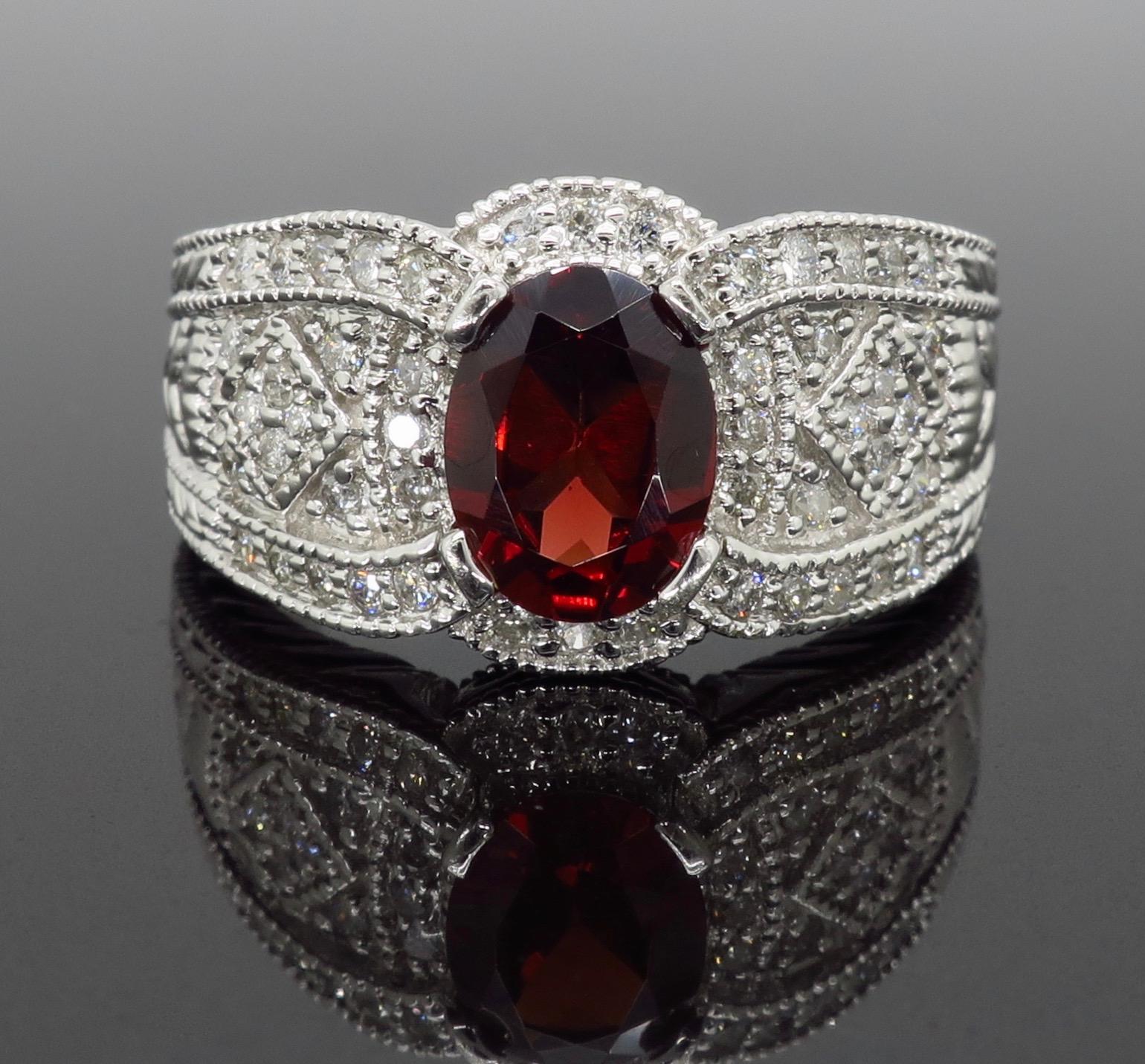 Oval Cut Garnet and Diamond Filigree Ring in 14 Karat White Gold