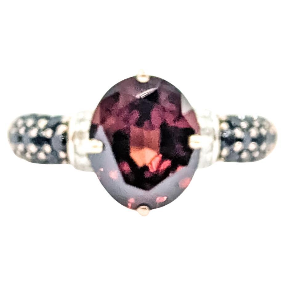 Anello con pavé di granati e diamanti in oro rosa 10k