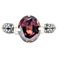 Anello con pavé di granati e diamanti in oro rosa 10k