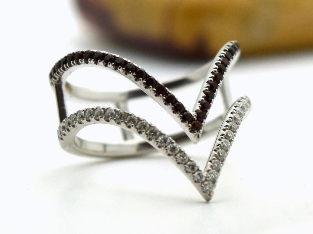 Fashion ring with stunning pyrope garnets and diamonds in 14KT white gold, the ring was made in V shape for Victory! Excellent craftsmanship! Diamonds totaling 0.40 carats and garnets are 0.50 carats. Size is 6 and can be re-sized.

Certificate