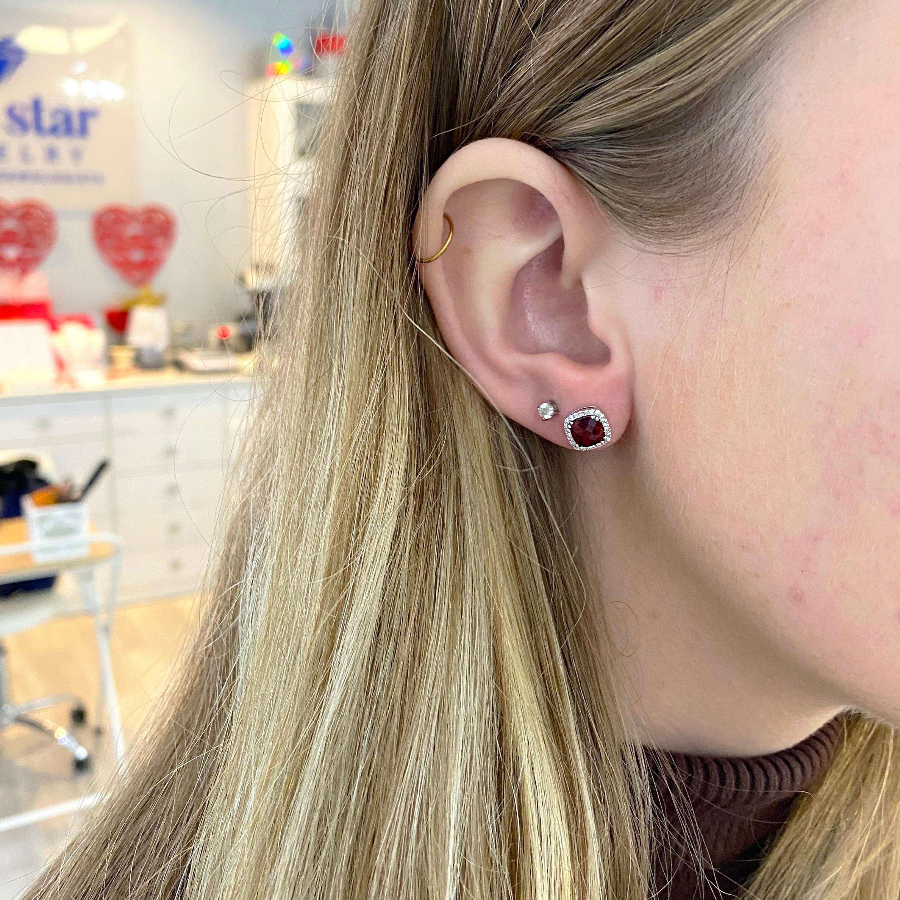 The details for these gorgeous garnet and diamond earrings are listed below:
1 Set
Metal Quality: 14 Karat White Gold
Earring Type: Stud
Diamond Number: 48
Diamond Total Weight: .20 Carat
Diamond Shape: Round
Diamond Clarity: VS2-SI1
Diamond Color: