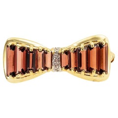 Garnet Diamond Yellow Gold Bow Brooch