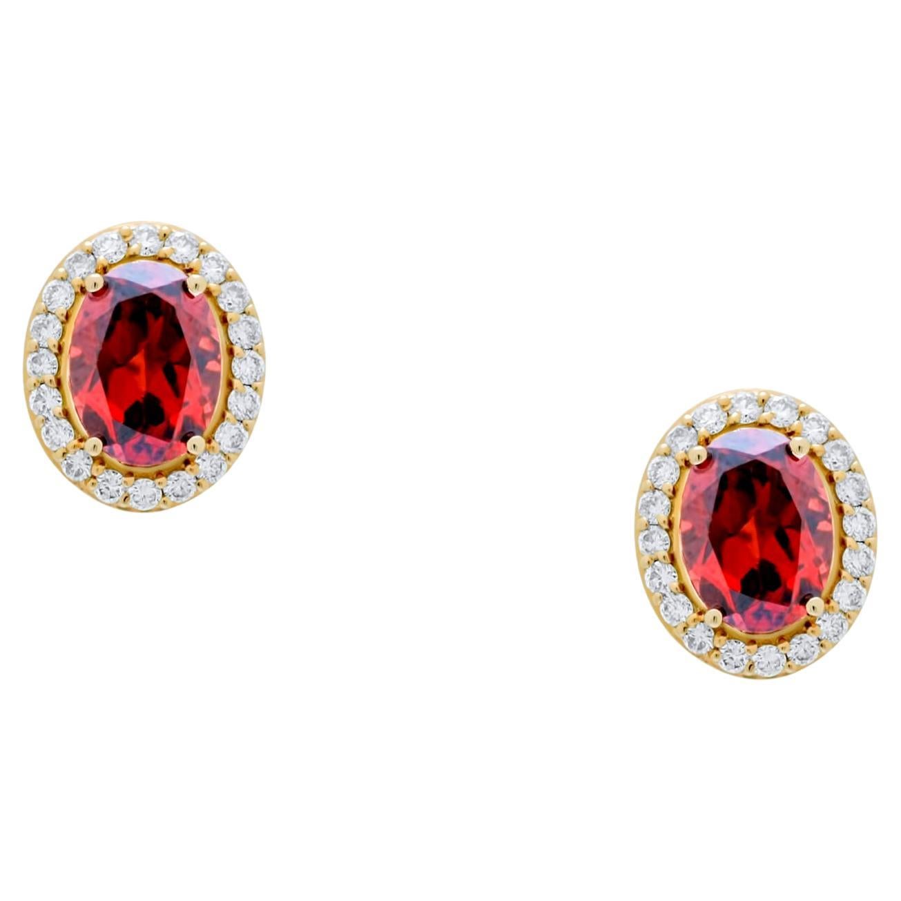 Clous d'oreilles uniques en or rose 18 carats avec grenat rhodolite rouge ovale et halo de diamants