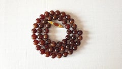 Collier de perles en grenat et hessonite