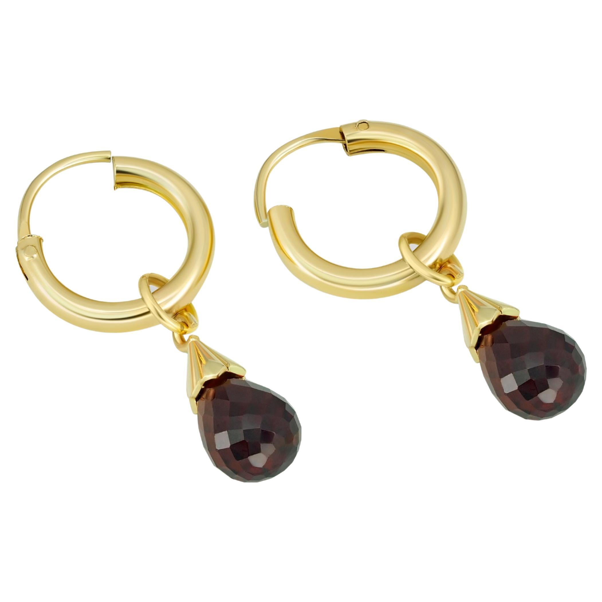 Garnet huggy hoop earrings.  For Sale